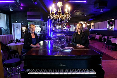 Image of owners in resturant